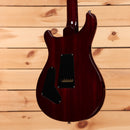 Paul Reed Smith Custom 24 Dark Cherry Sunburst electric guitar with humbucker pickup and black pickguard
