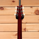 Paul Reed Smith Custom 24 electric guitar dark cherry sunburst with humbucker pickups and black tuning machines