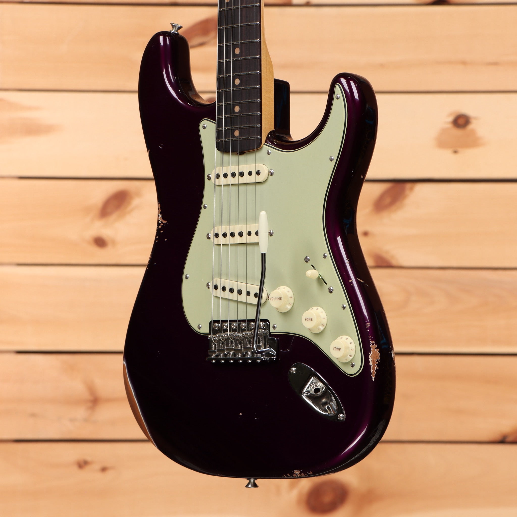Fender Custom Shop Righteous Reissue Late 1962 Stratocaster electric guitar Midnight Purple relic aged with mint green pickguard and single-coil pickups