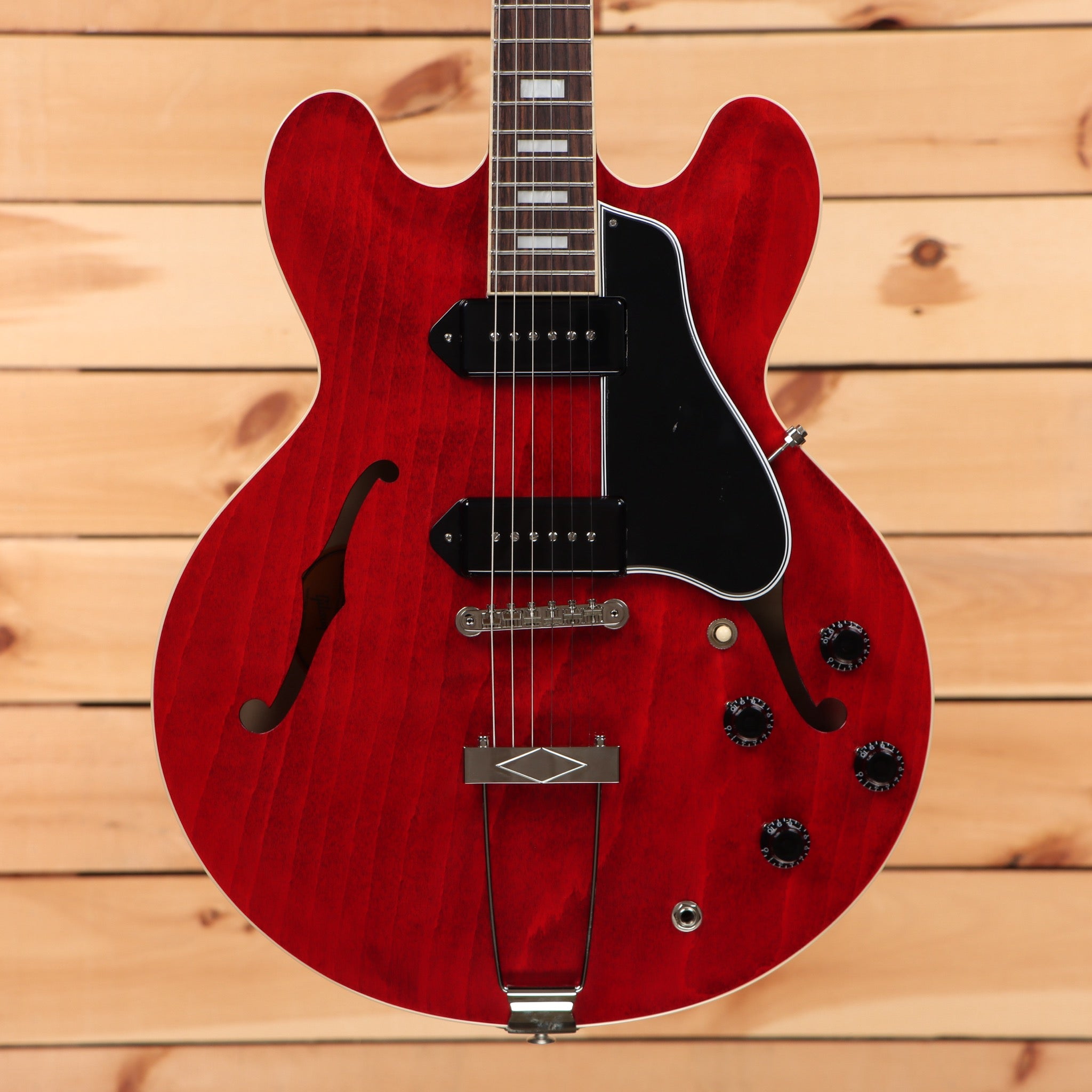Gibson ES-330 semi-hollow body electric guitar Sixties Cherry with black pickguard and f-holes