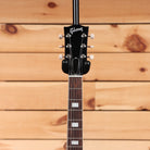 Gibson ES-330 semi-hollow electric guitar Sixties Cherry with P90 pickups and rosewood fretboard