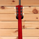 Gibson ES-330 semi-hollow body electric guitar Sixties Cherry with dual P90 pickups and f-holes