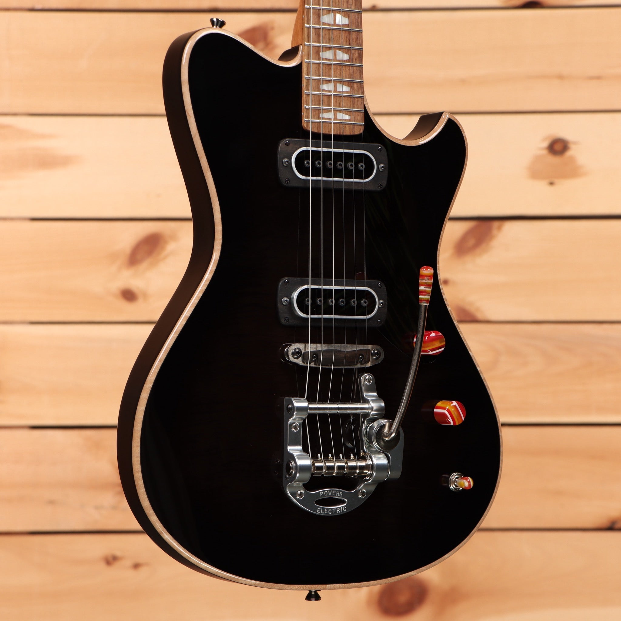 Powers Electric A-Type Select Shadow Black electric guitar with dual humbuckers and vibrato bridge