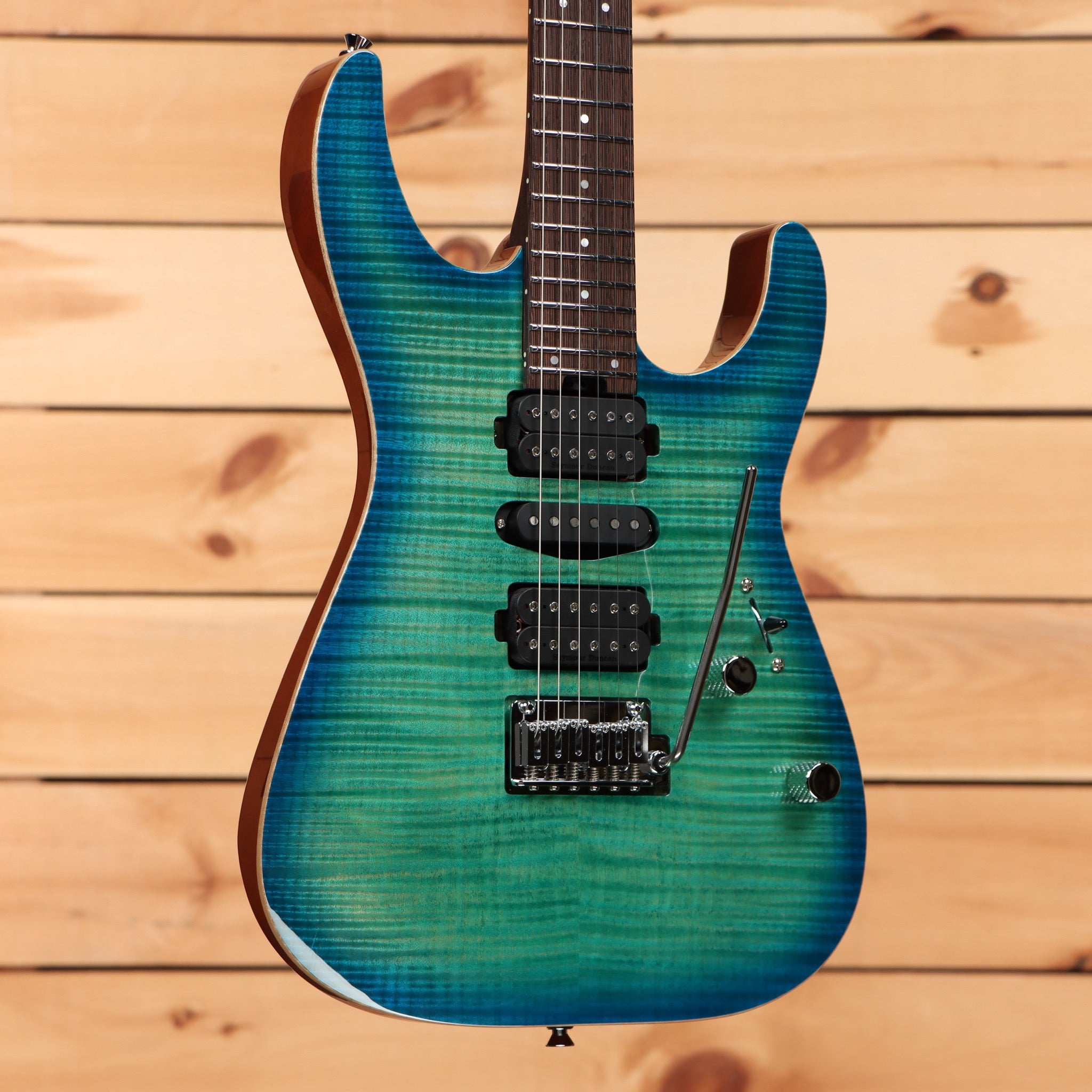 Charvel MJ DK24 HSH electric guitar Caribbean Burst with three humbucker pickups and tremolo bridge