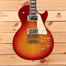 Gibson Les Paul Studio Heritage Cherry Sunburst electric guitar with dual humbucker pickups and gold hardware