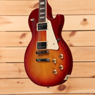 Gibson Les Paul Studio Heritage Cherry Sunburst electric guitar with dual humbucker pickups and gold hardware