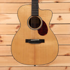Eastman E1OMC Special acoustic guitar natural finish with cutaway and tortoiseshell pickguard