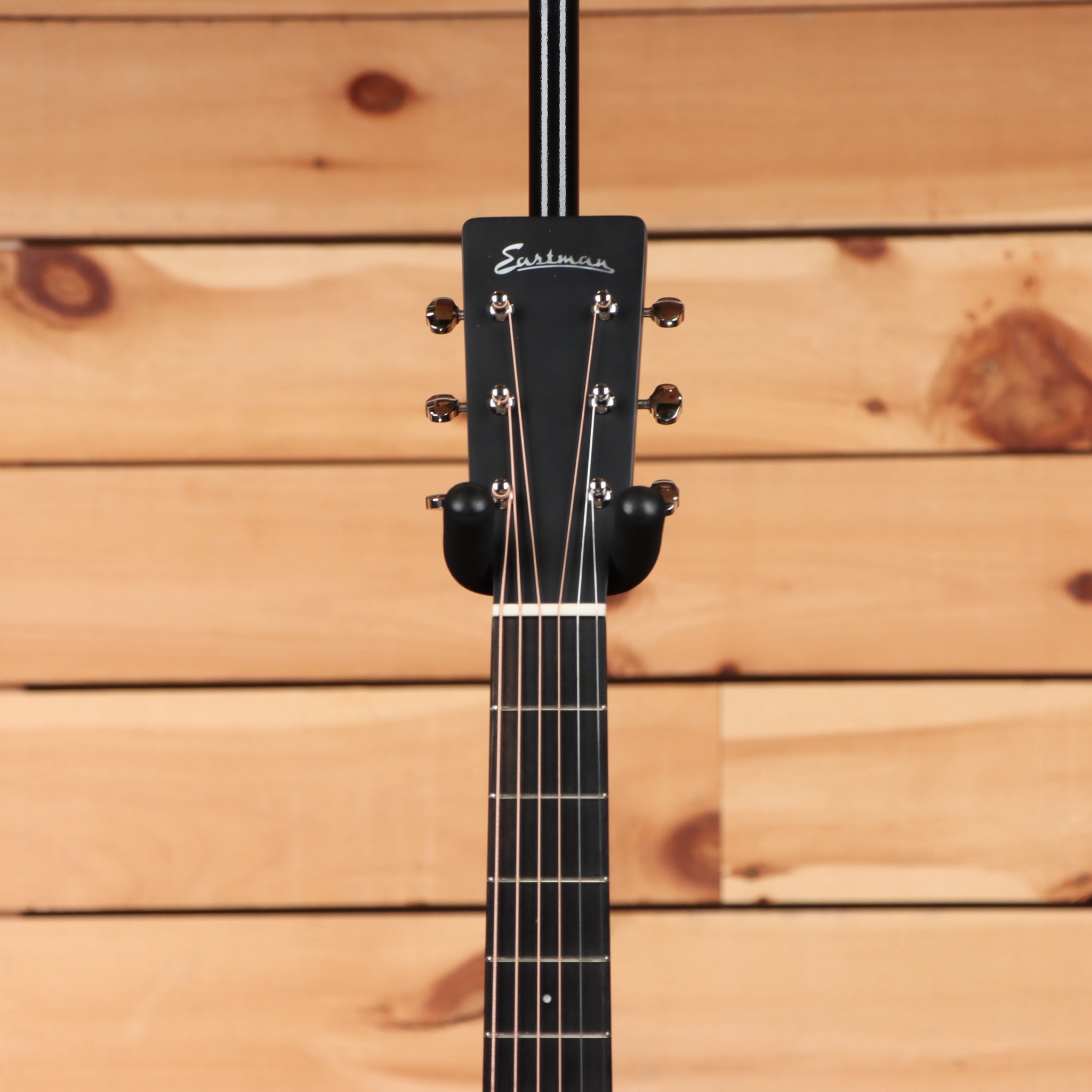 Eastman E1OMC Special acoustic guitar natural finish with mahogany body and slotted headstock