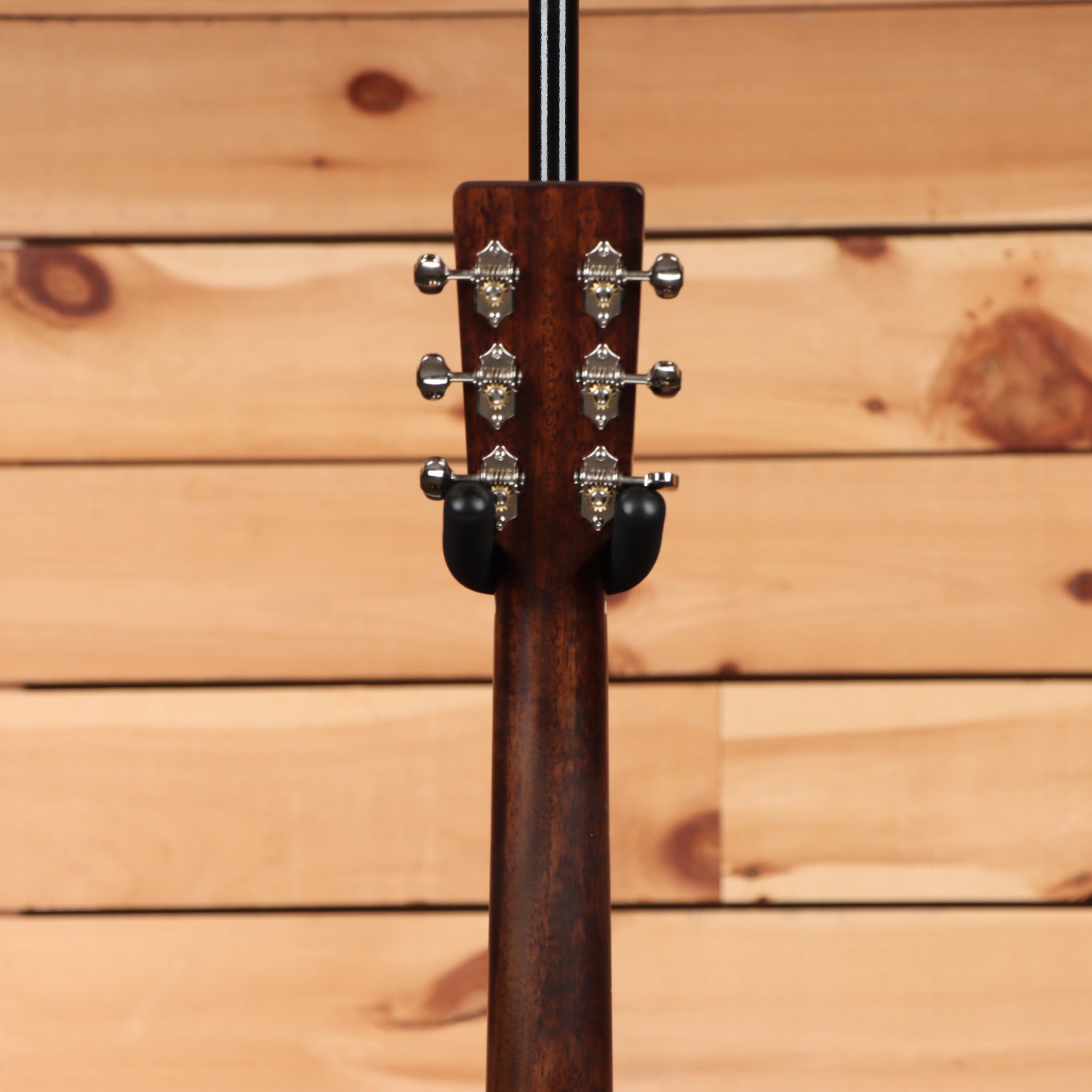 Eastman E1OMCESPECIAL acoustic guitar natural finish with chrome tuning machines and black headstock veneer