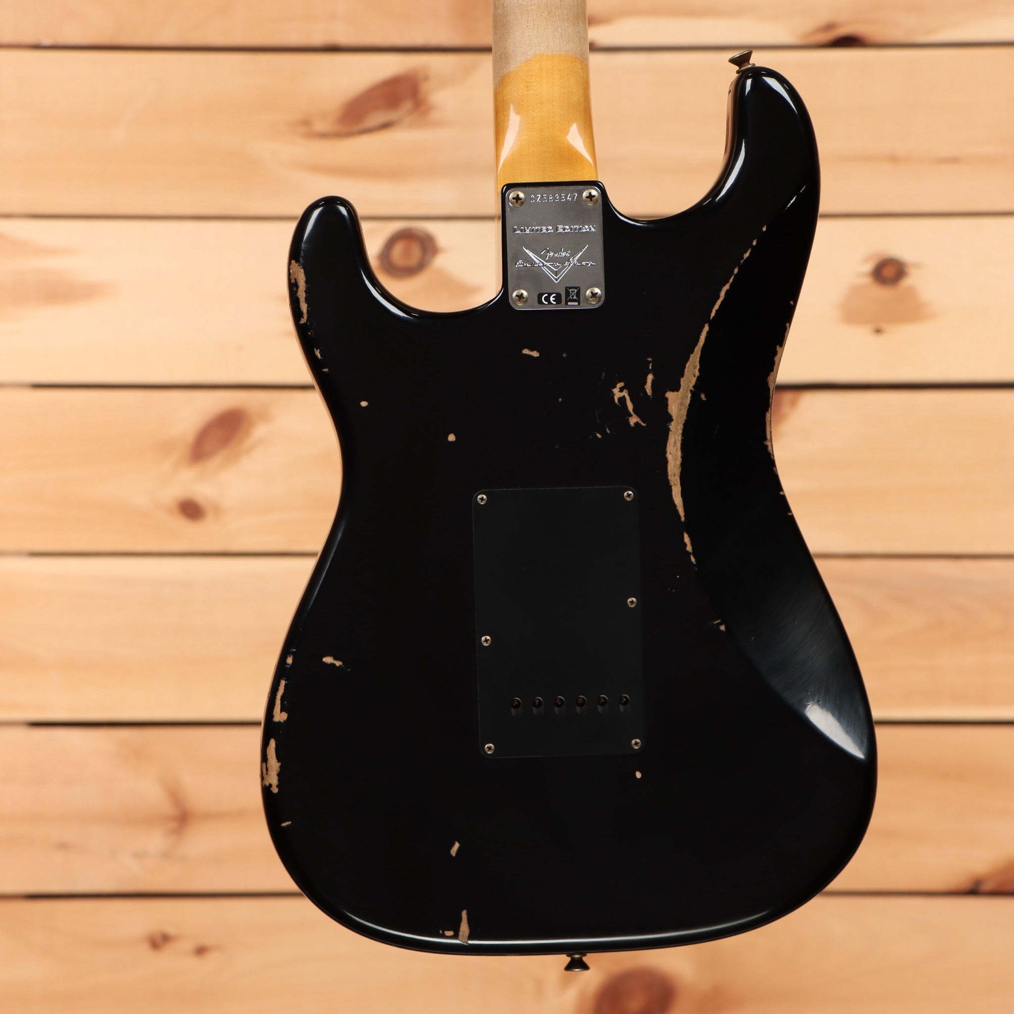 Fender Custom Shop Limited 1967 HSS Stratocaster relic aged black electric guitar with single-coil pickups and heavy wear patina