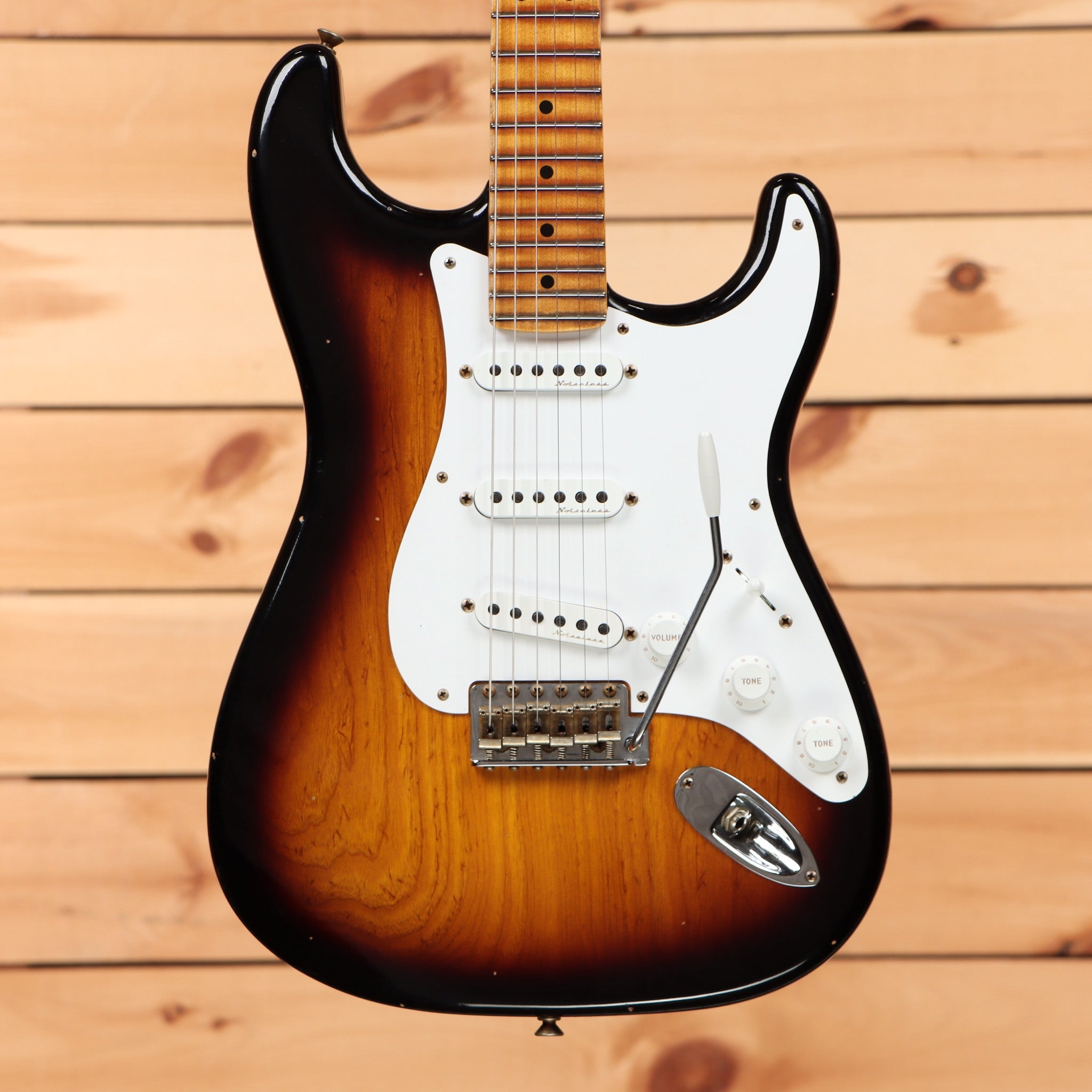 Fender Custom Shop Eric Clapton Stratocaster Journeyman Relic 2-Color Sunburst electric guitar with white pickguard and single-coil pickups