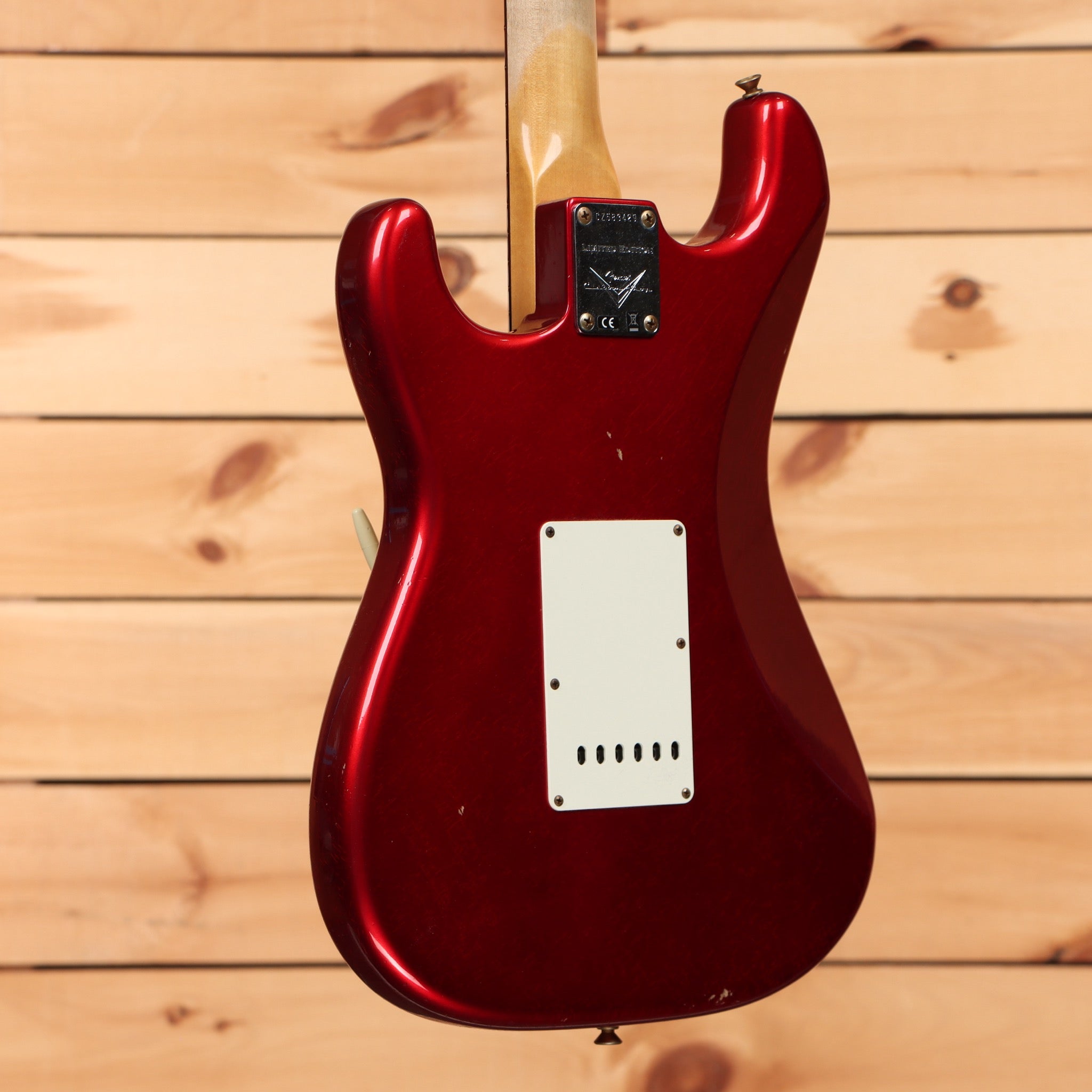 Fender Custom Shop Limited 1963 Stratocaster Journeyman Relic Aged Candy Apple Red electric guitar with white pickguard