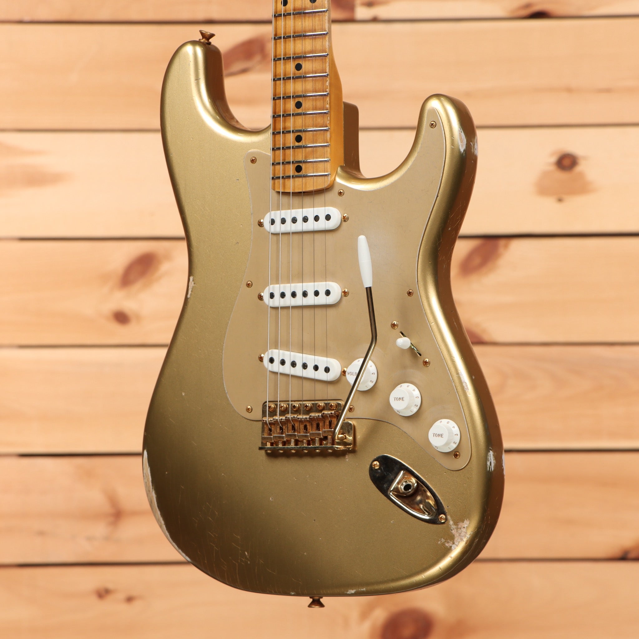 Fender Custom Shop Limited 1955 Bone Tone Stratocaster relic aged electric guitar with single-coil pickups and gold hardware