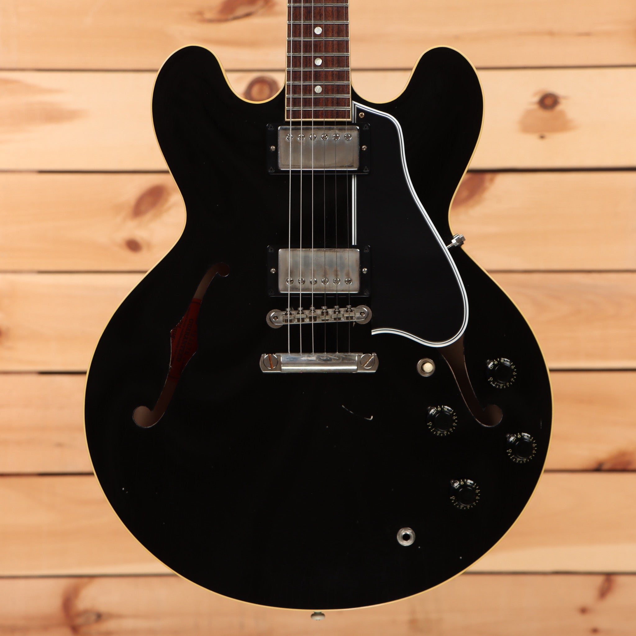 Pre-owned Gibson ES-335 semi-hollow electric guitar Ebony with dual humbuckers and f-holes