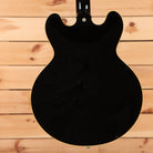Pre-owned Gibson ES-335 semi-hollow electric guitar Ebony with f-holes and dual humbuckers