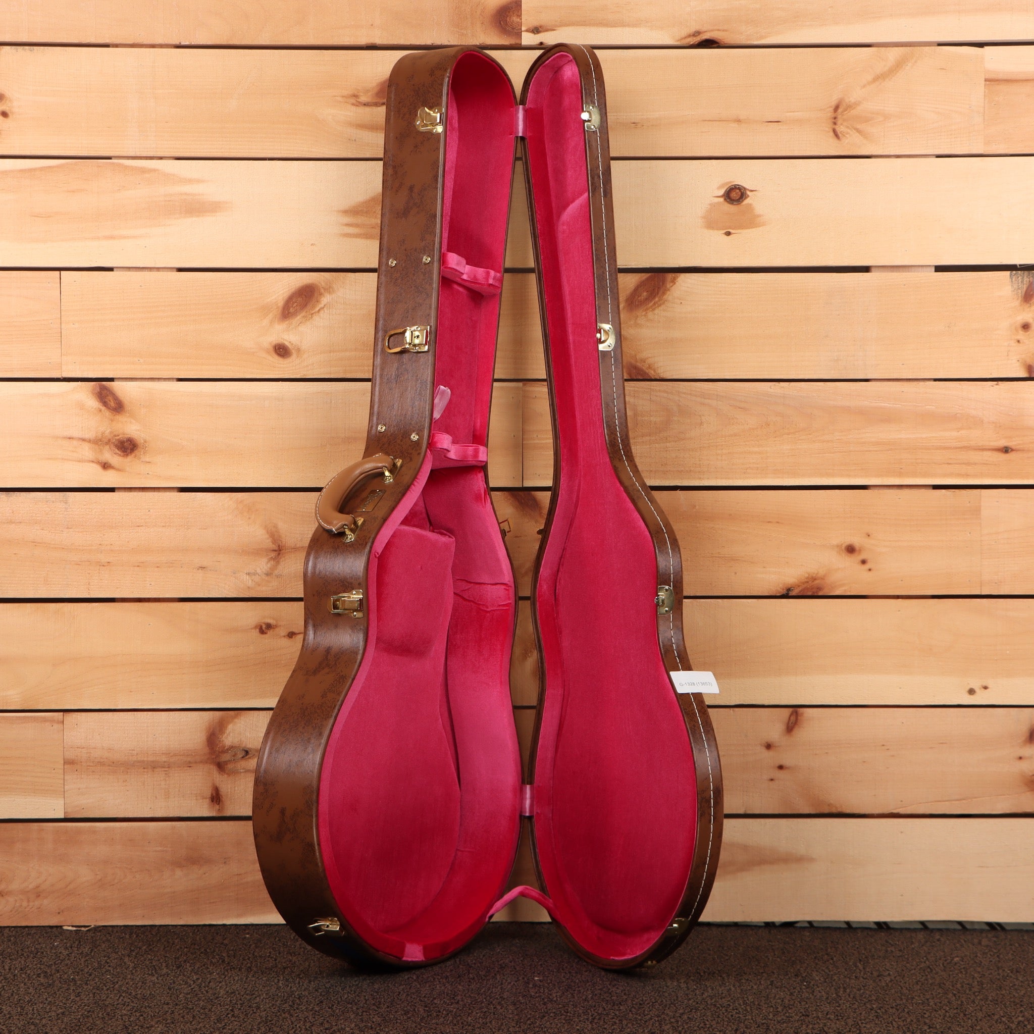 Pre-owned Gibson ES-335 semi-hollow electric guitar Aged Ebony with burgundy red interior case