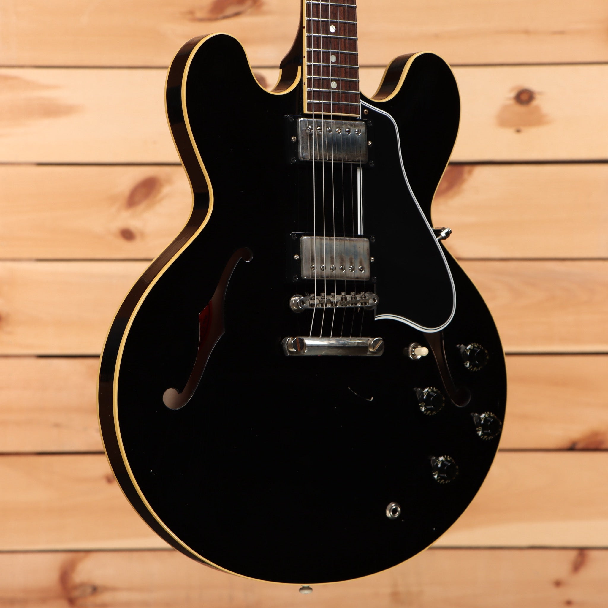 Pre-owned Gibson ES-335 semi-hollow electric guitar Aged Ebony with dual humbuckers and f-holes