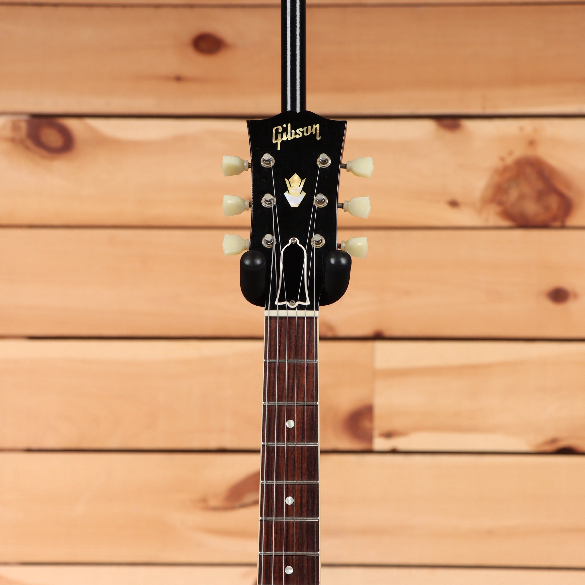 Pre-owned Gibson ES-335 semi-hollow electric guitar aged ebony with cream tuning pegs
