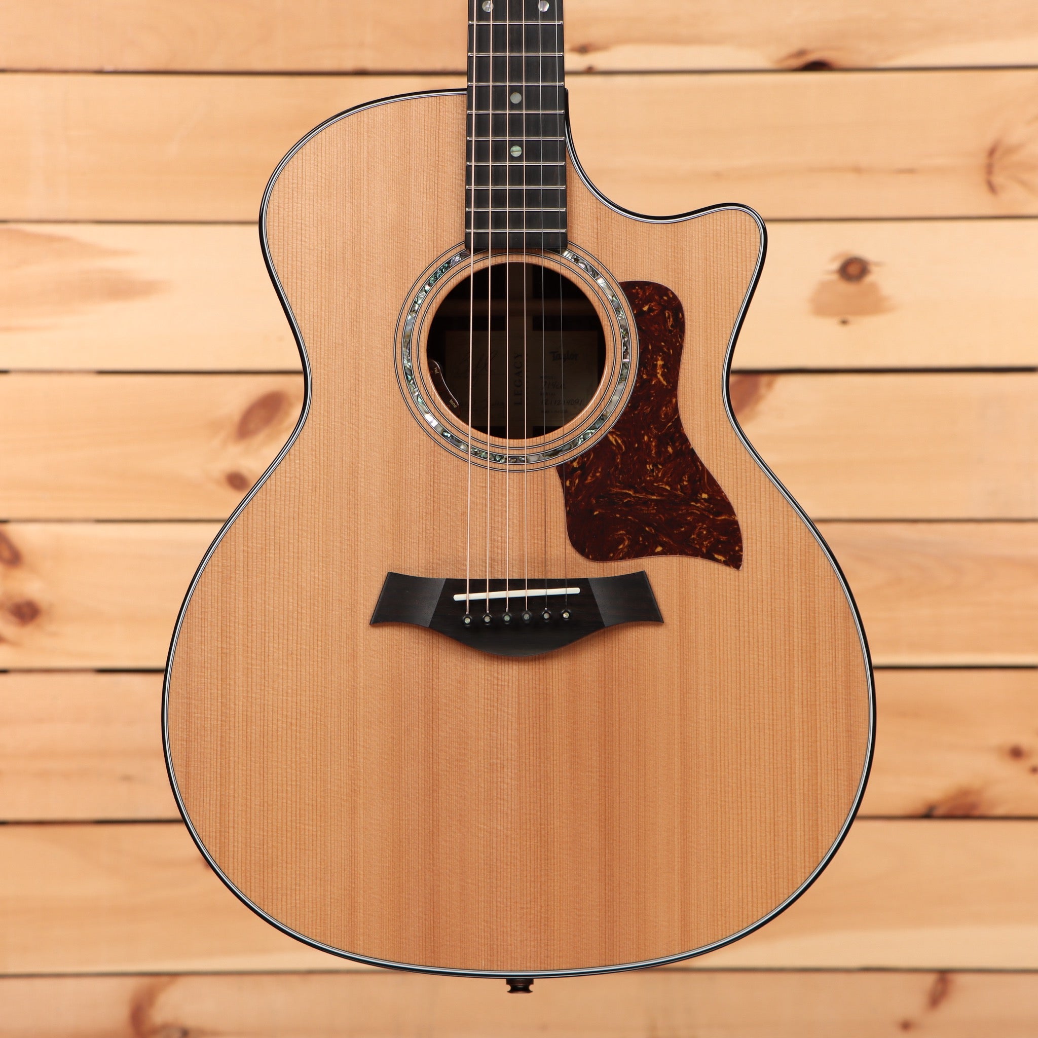 Taylor Legacy 714ce Grand Auditorium acoustic guitar natural finish with venetian cutaway