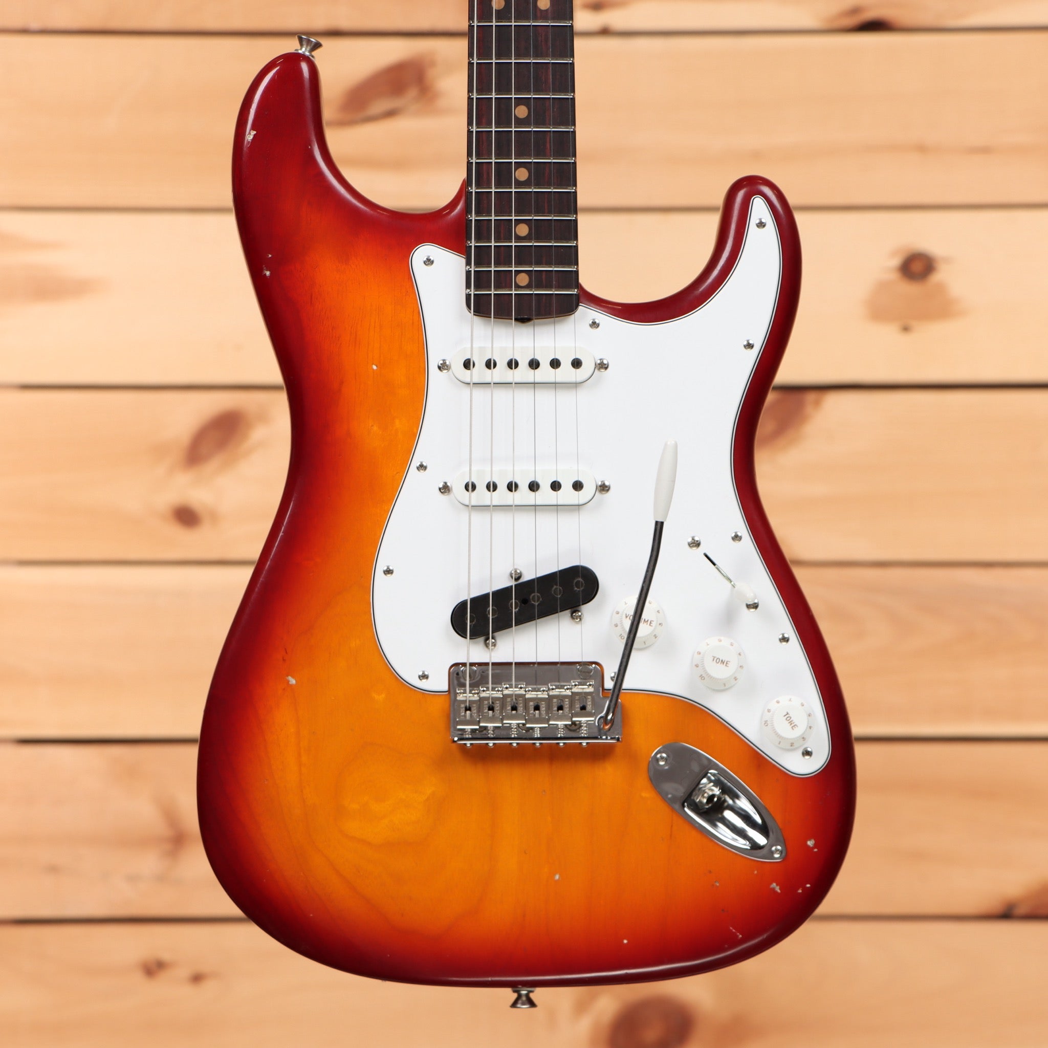 Fender Custom Shop Kyle McMillin Masterbuilt Stratocaster electric guitar Aged Cherry Sunburst with white pickguard and single-coil pickups