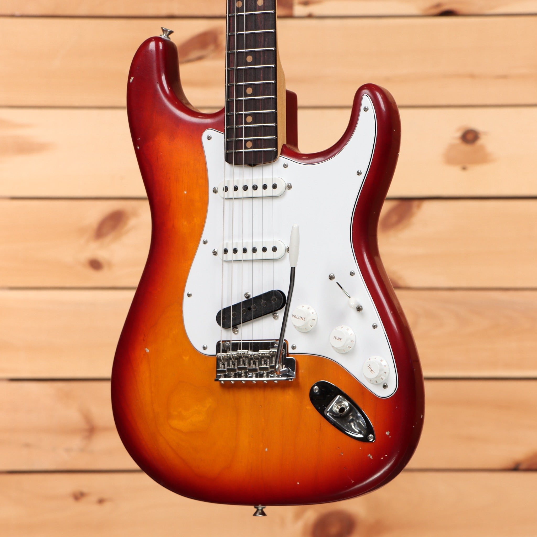 Fender Custom Shop Kyle McMillin Masterbuilt Stratocaster electric guitar Aged Cherry Sunburst with white pickguard and single-coil pickups