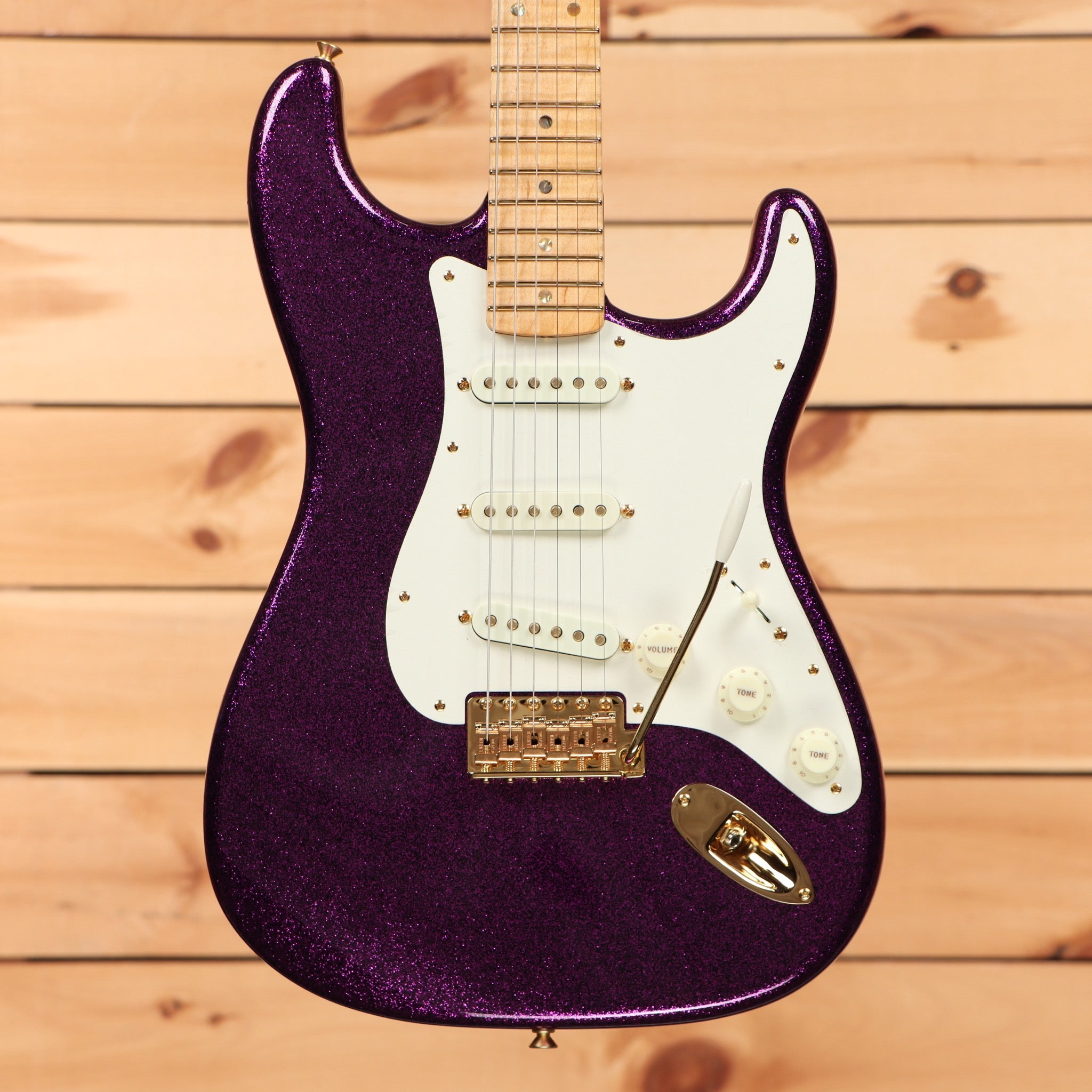 Fender Custom Shop Limited 1954 Stratocaster electric guitar Aged Magenta Sparkle with maple neck and gold hardware