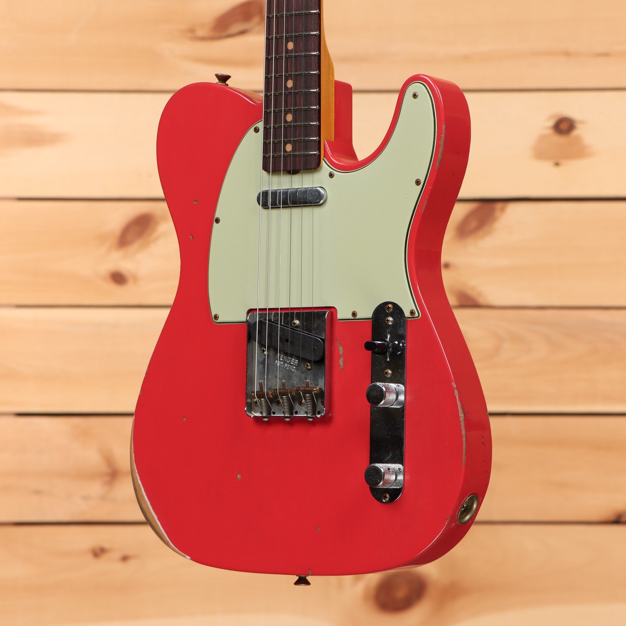 Fender Custom Shop 1963 Telecaster Relic electric guitar Fiesta Red with single-coil pickup and aged finish