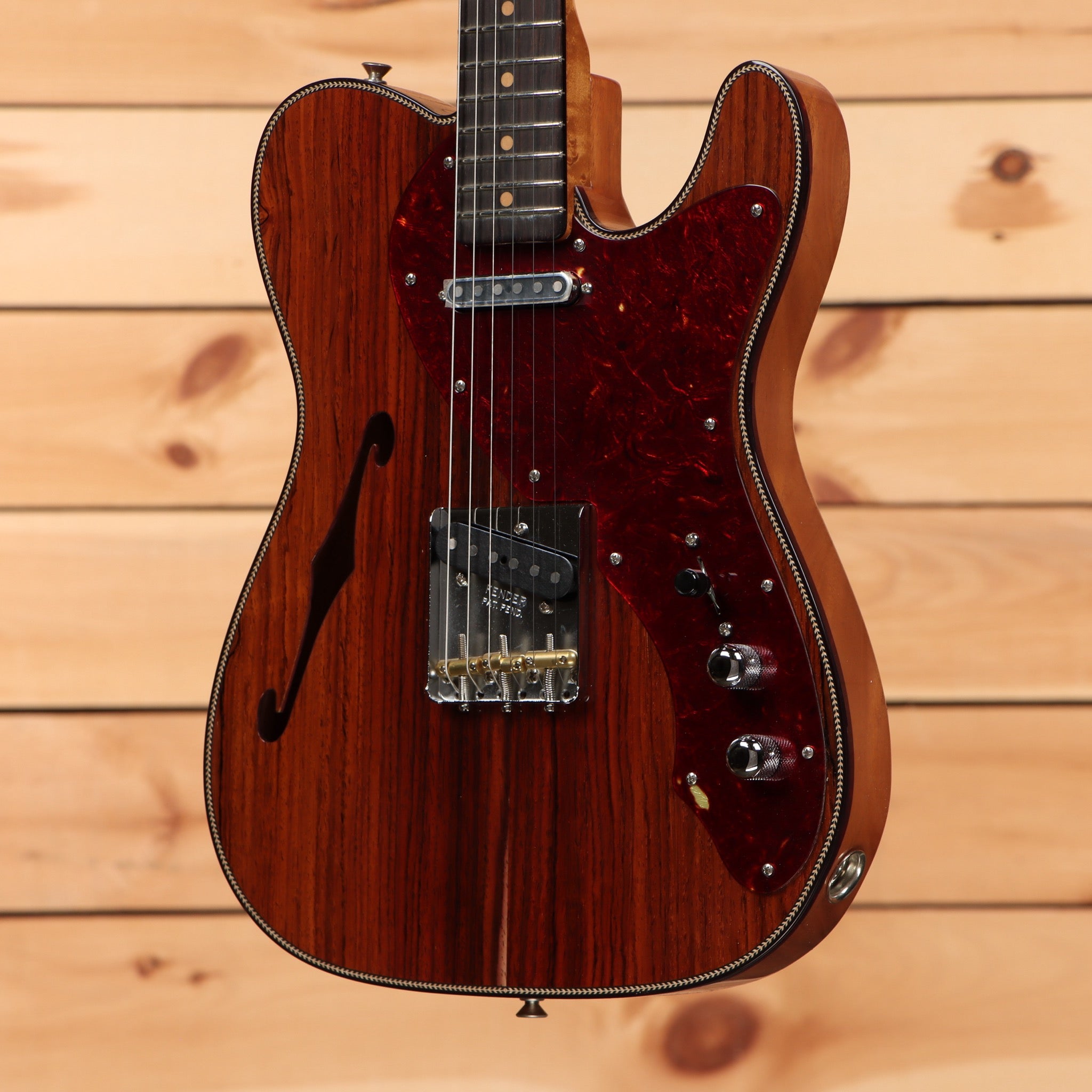 Fender Custom Shop Artisan Coco Thinline Telecaster semi-hollow electric guitar with tortoiseshell pickguard and binding detail