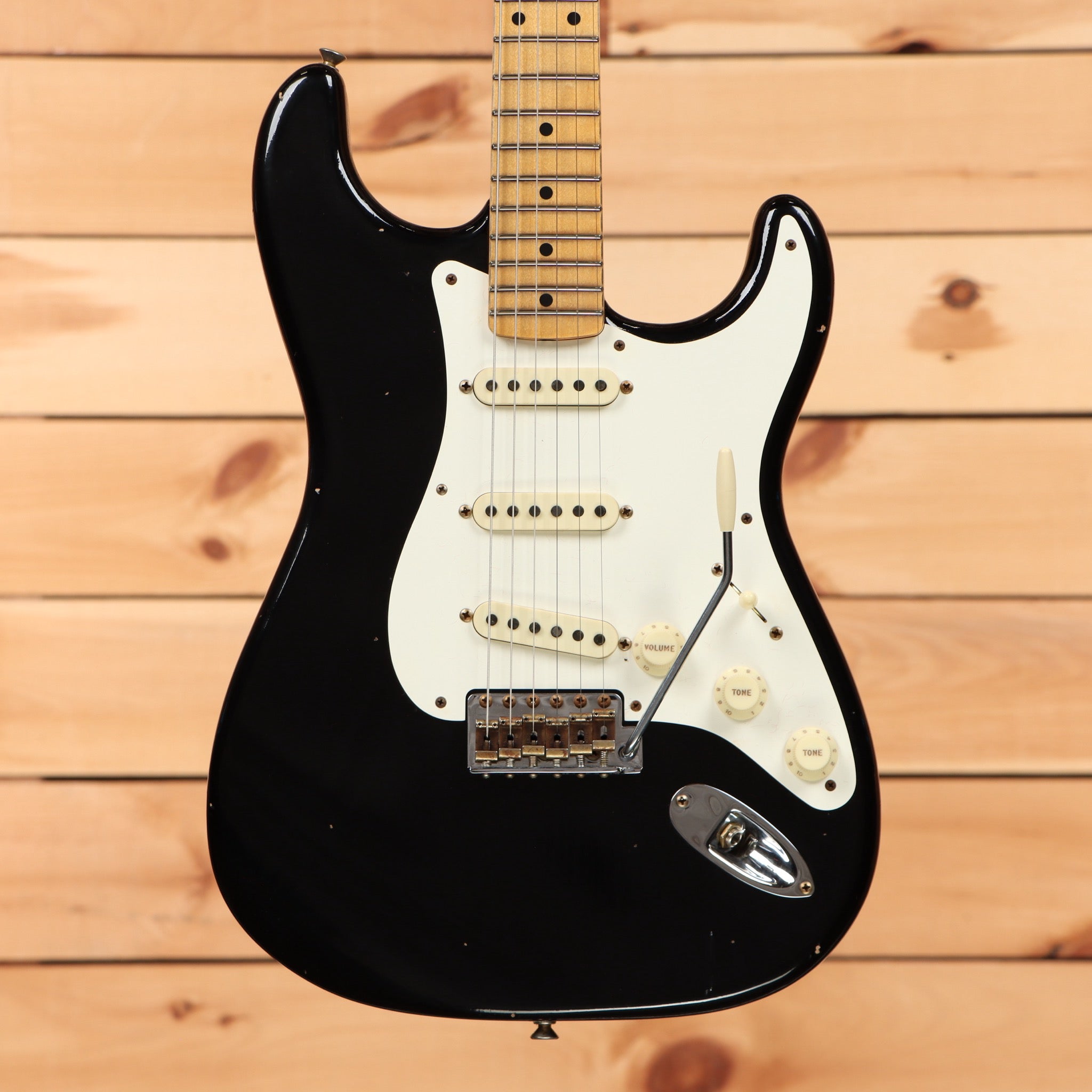 Fender Custom Shop 1956 Stratocaster Journeyman Relic electric guitar aged black with white pickguard and single-coil pickups