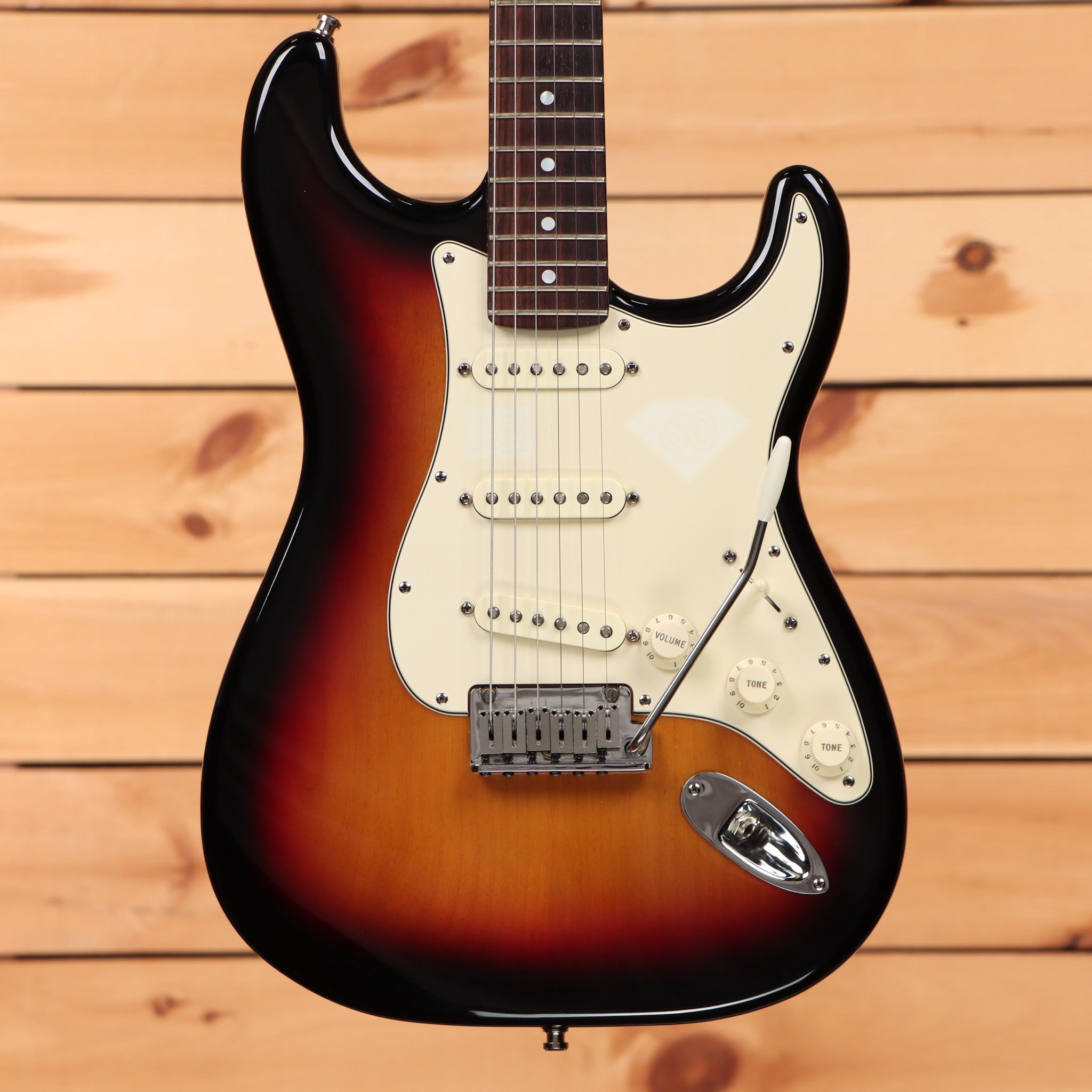 Fender Limited 60th Anniversary Stratocaster electric guitar 3-Color Sunburst with three single-coil pickups and mint pickgua