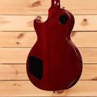 Pre-owned Gibson Les Paul Supreme wine red electric guitar with dual humbuckers and cutaway body