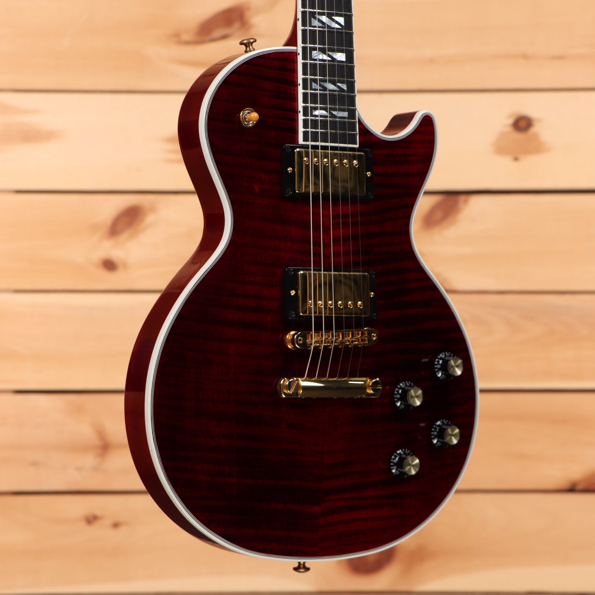 Pre-owned Gibson Les Paul Supreme wine red electric guitar with flamed maple top and dual humbuckers