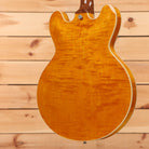 Gibson ES-335 semi-hollow electric guitar Honey Amber figured maple top with white binding