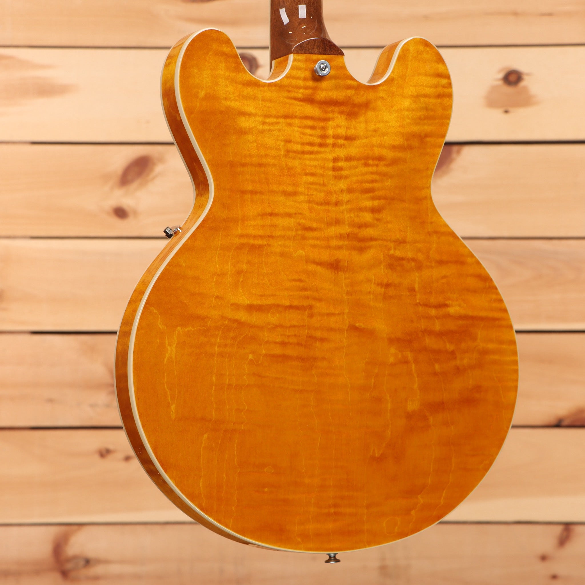 Gibson ES-335 semi-hollow electric guitar Figured Honey Amber with white binding and f-holes