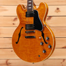 Gibson ES-335 semi-hollow body electric guitar Figured Honey Amber with dual humbuckers and f-holes