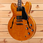 Gibson ES-335 semi-hollow body electric guitar Figured Honey Amber with dual humbuckers and f-holes