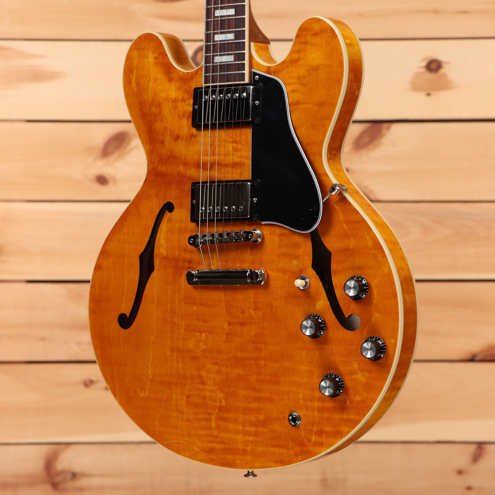 Gibson ES-335 semi-hollow body electric guitar Figured Honey Amber with dual humbuckers and f-holes