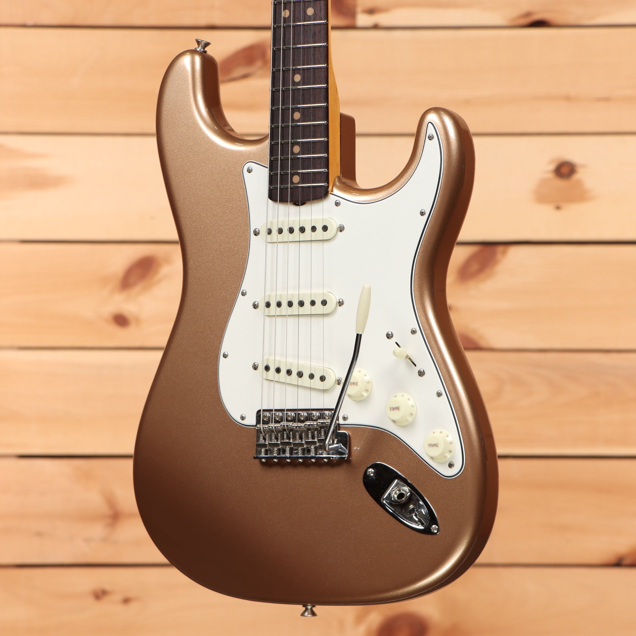 Fender Custom Shop 1964 L-Series Stratocaster electric guitar Firemist Gold with white pickguard and single-coil pickups