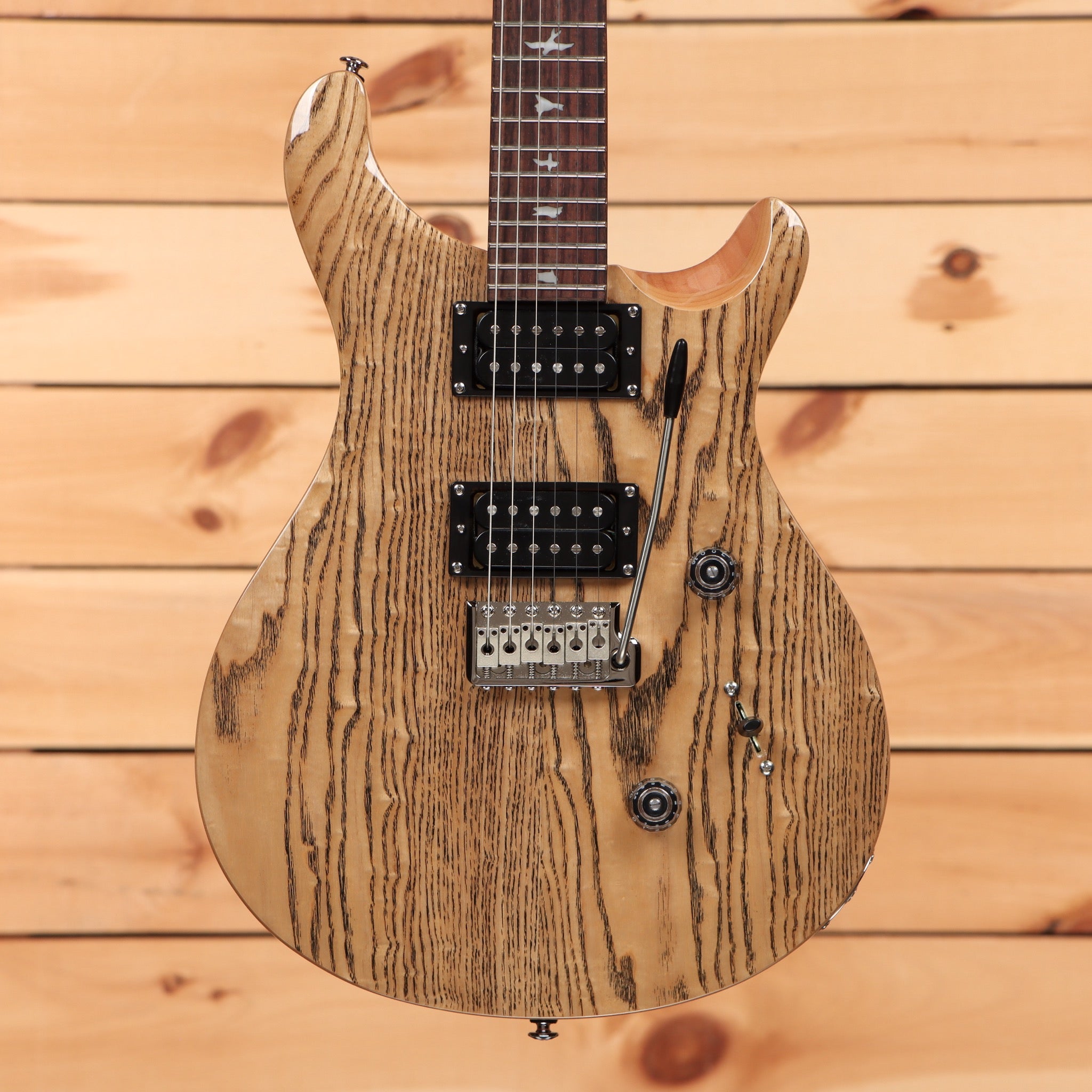 Paul Reed Smith SE Custom 24 electric guitar burled ash natural finish with dual humbucker pickups