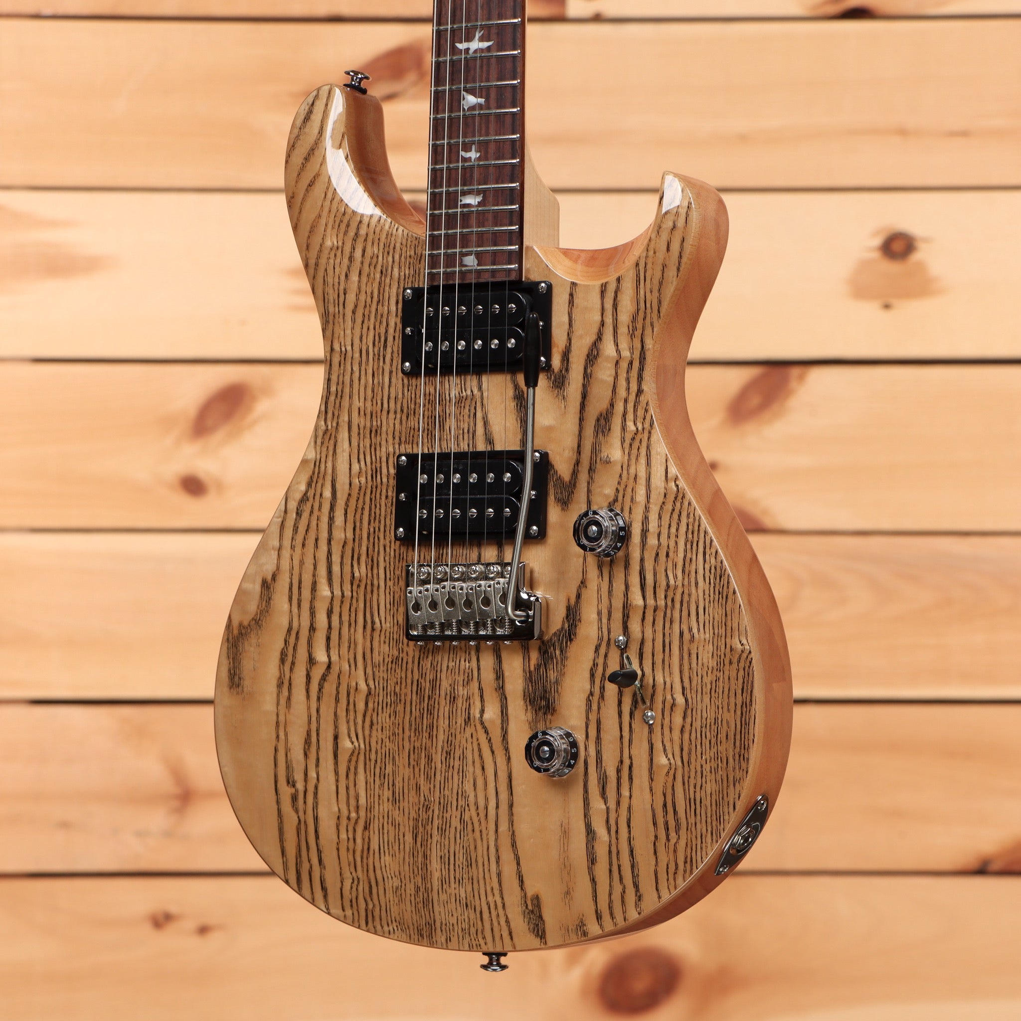 Paul Reed Smith SE Custom 24 electric guitar burled ash natural finish with dual humbucker pickups