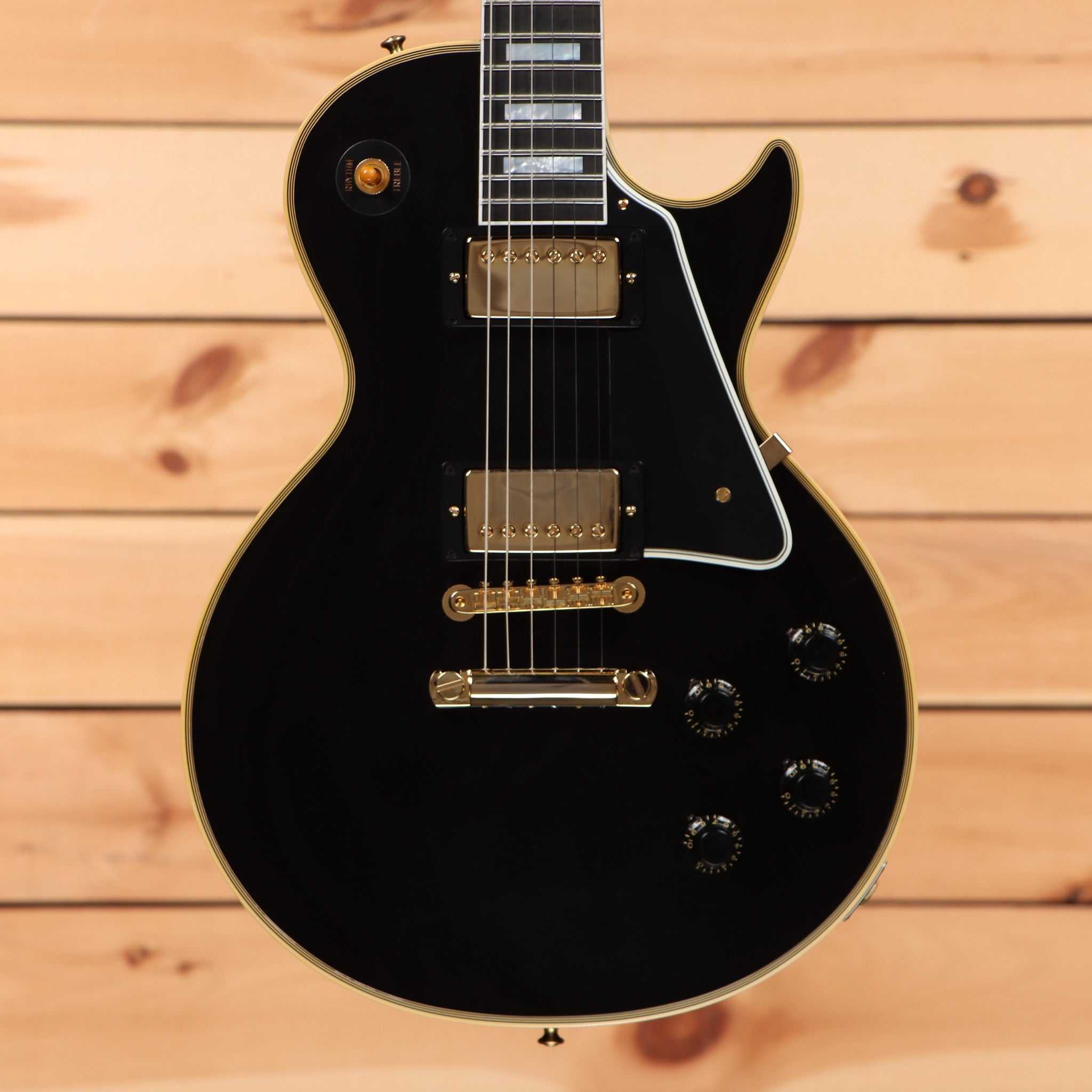 Gibson 1957 Les Paul Custom Reissue electric guitar Ebony VOS finish with dual humbuckers and gold hardware