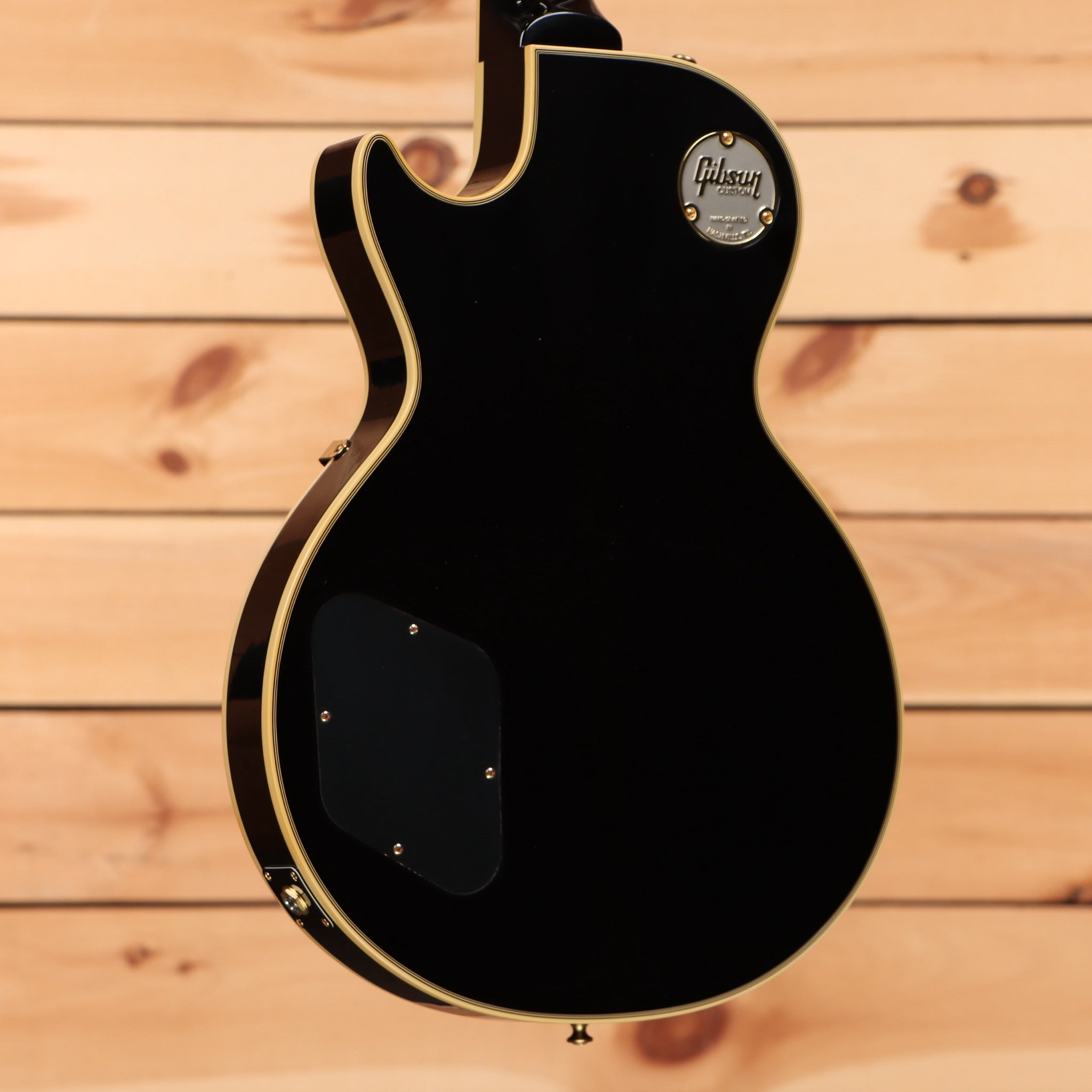 Gibson 1957 Les Paul Custom Reissue electric guitar Ebony VOS finish with dual humbuckers and gold binding