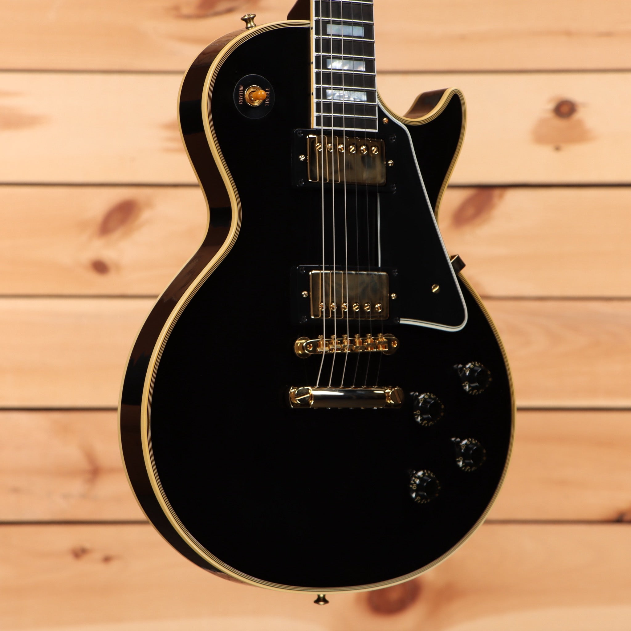 Gibson 1957 Les Paul Custom Reissue electric guitar Ebony VOS with dual humbuckers and gold hardware