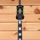 Gibson 1957 Les Paul Custom Reissue electric guitar Ebony VOS with dual humbuckers and gold hardware