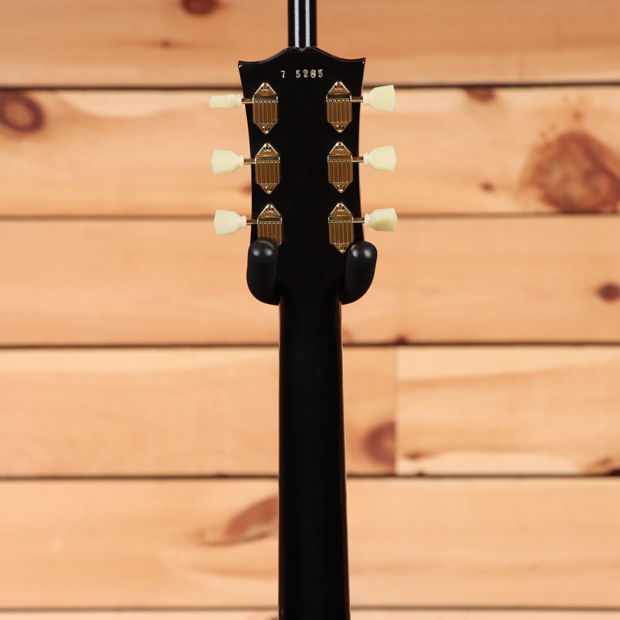 Gibson 1957 Les Paul Custom Reissue electric guitar Ebony VOS finish with gold hardware and dual humbuckers