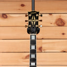 Pre-owned Gibson 1988 Les Paul Custom ebony electric guitar with gold hardware and maple neck