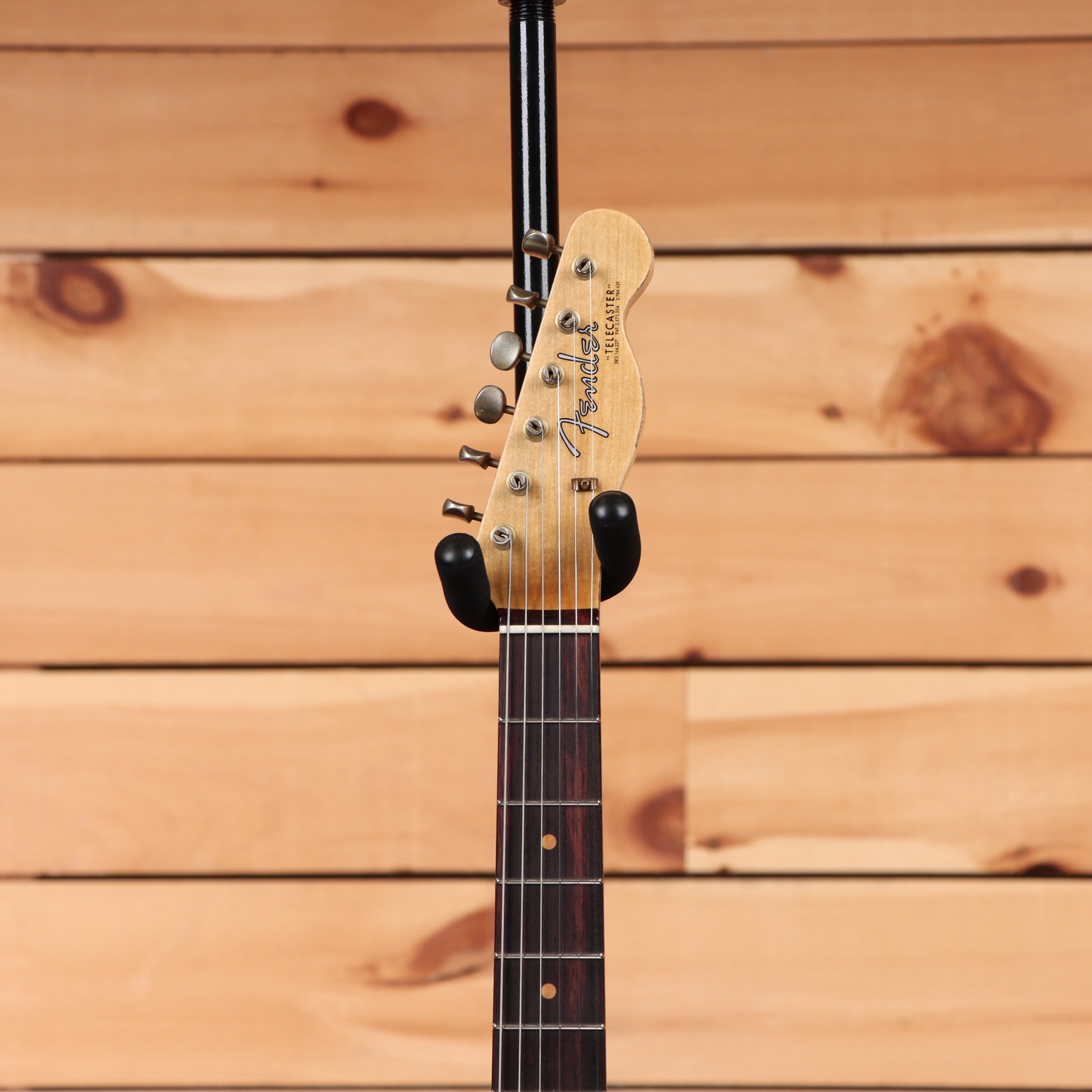 Pre-owned Fender Custom Shop 1963 Telecaster Relic electric guitar Fiesta Red with maple neck and single-coil pickups
