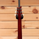 Paul Reed Smith Limited Charcoal Phoenix electric guitar with black tuning machines and white pearloid buttons