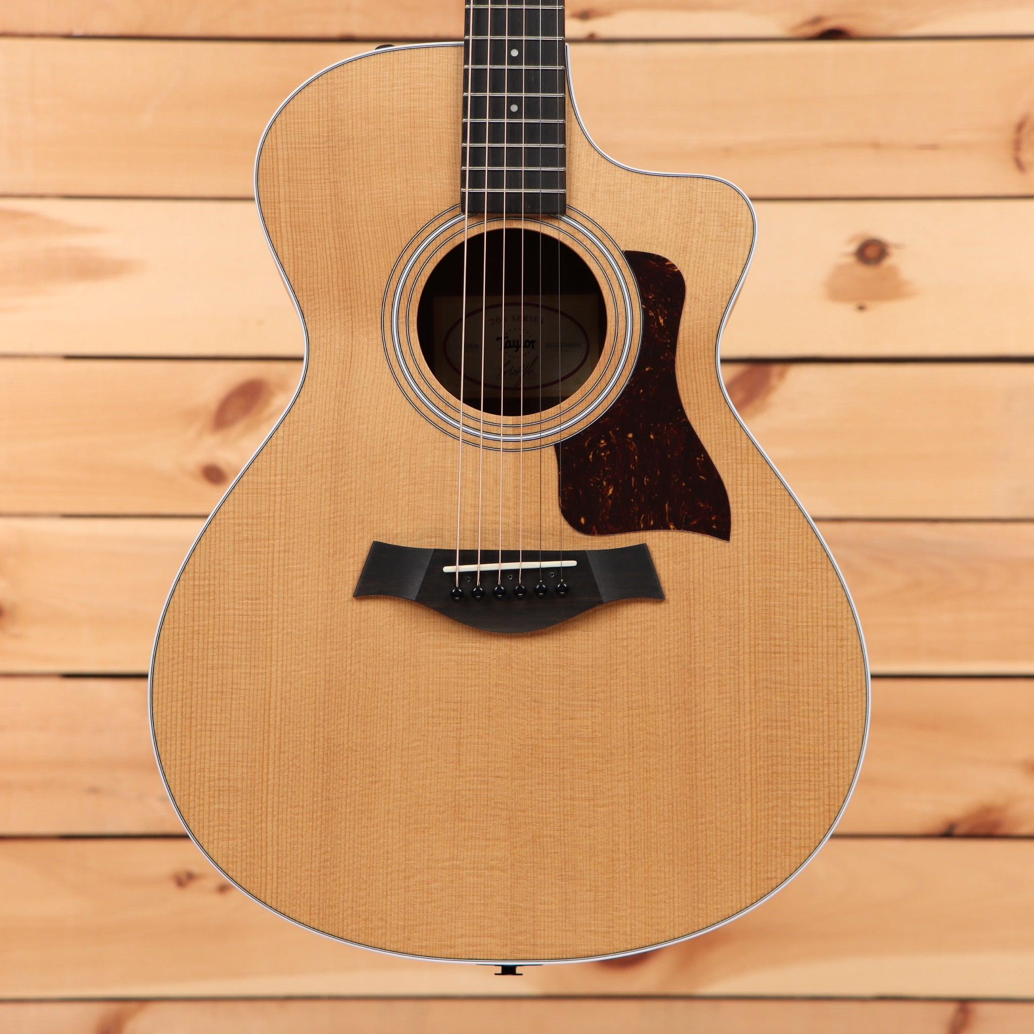 Taylor 212ce Grand Concert acoustic guitar natural finish with venetian cutaway