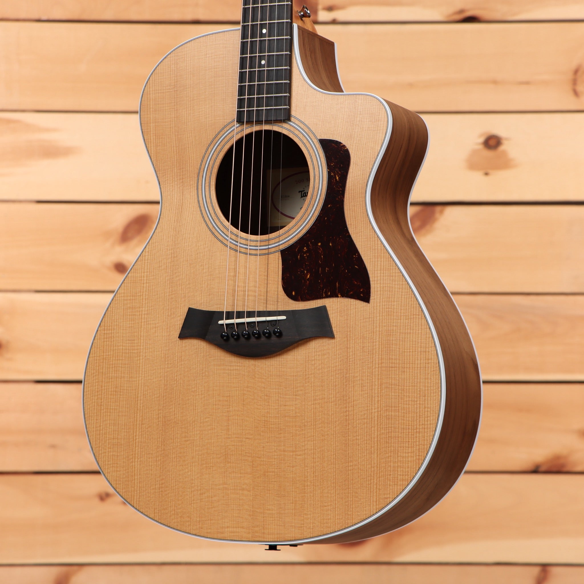 Taylor 212ce Grand Concert acoustic guitar natural finish with venetian cutaway